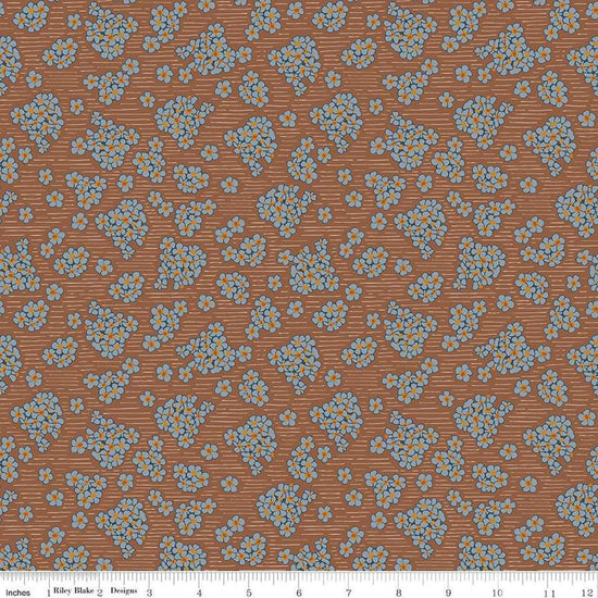 Image of the Honey Locust Hydrangeas Saddle quilting cotton fabric by Riley Blake Designs. Features flowers on a brown background