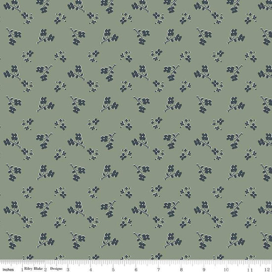 Image of the Honey Locust Saddle Grove quilting cotton fabric by Riley Blake Designs. Features flowers on a green background.