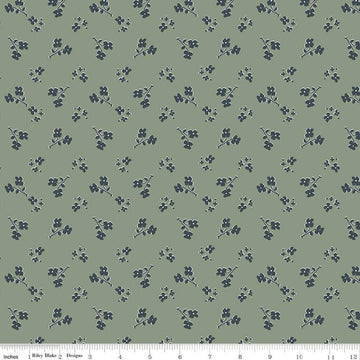 Image of the Honey Locust Saddle Grove quilting cotton fabric by Riley Blake Designs. Features flowers on a green background.