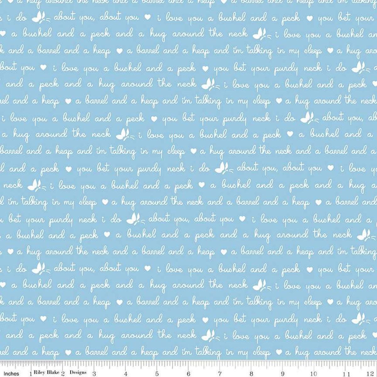 Image of the Love Notes Text Blue quilting cotton fabric by Riley Blake Designs. Features text on a blue background. Cute Little Fabric Shop