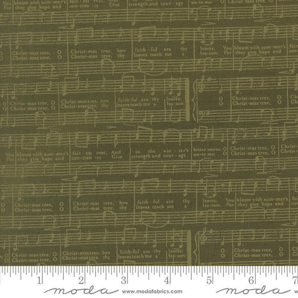 Image of the Berry and Pine Notes Wintergreen quilting cotton fabric by Moda Fabrics. Features music notes on a green background. Cute Little Fabric Shop