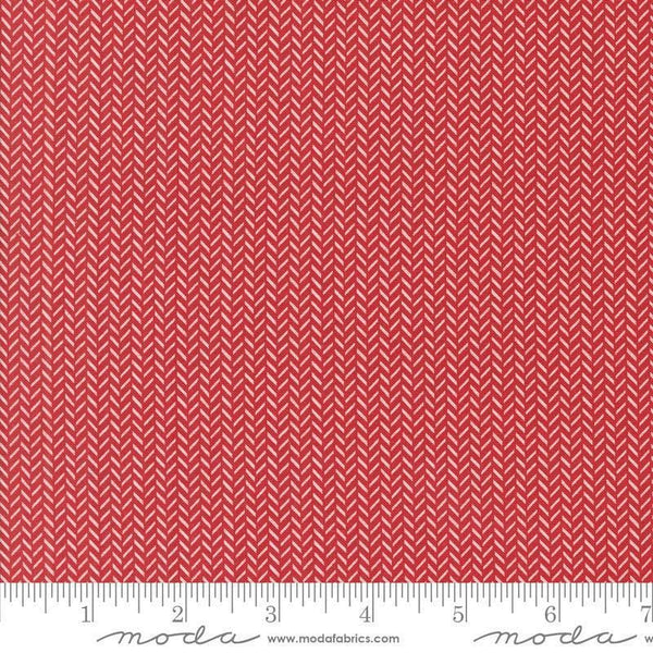 Image of the Berry and Pine Yule Cranberry quilting cotton fabric by Moda Fabrics. Features herringbone on a red background. Cute Little Fabric Shop
