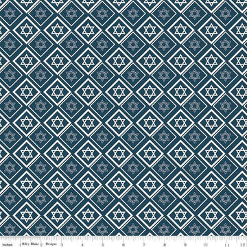 Image of the 8 Nights, 8 Lights Star of David Navy quilting cotton fabric by Riley Blake Designs. Features stars on a navy background. Cute Little Fabric Shop