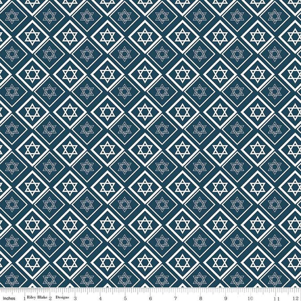 Image of the 8 Nights, 8 Lights Star of David Navy quilting cotton fabric by Riley Blake Designs. Features stars on a navy background. Cute Little Fabric Shop