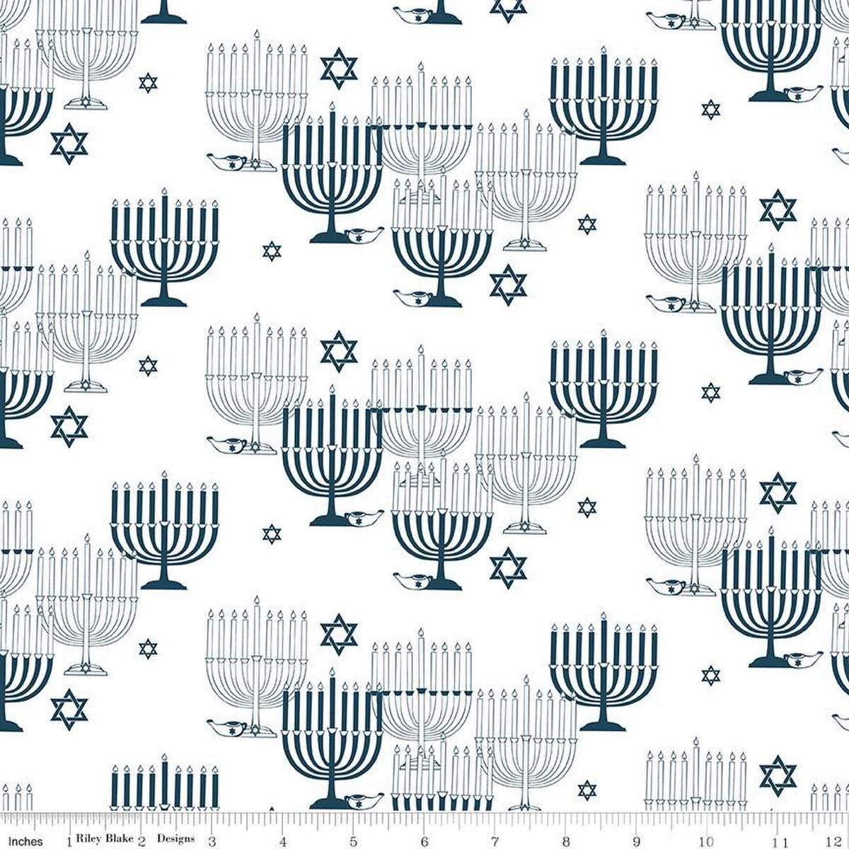 Image of the 8 Nights, 8 Lights Main White quilting cotton fabric by Riley Blake Designs. Features stars on a white background. Cute Little Fabric Shop