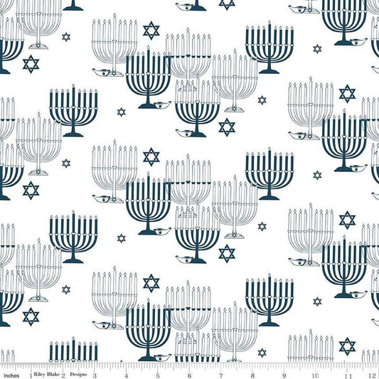 Image of the 8 Nights, 8 Lights Main White quilting cotton fabric by Riley Blake Designs. Features stars on a white background. Cute Little Fabric Shop
