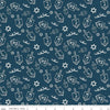 Image of the 8 Nights, 8 Lights Dreidel Toss Navy quilting cotton fabric by Riley Blake Designs. Features dreidels on a blue background. Cute Little Fabric Shop