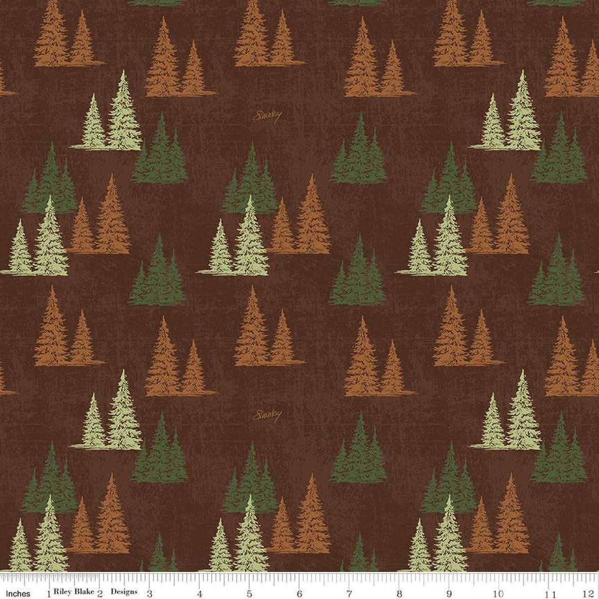 Image of the Friends of Smokey Bear Trees Bark quilting cotton fabric. Features trees on a brown background. Cute Little Fabric Shop