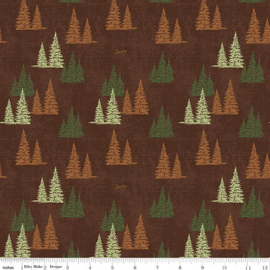 Image of the Friends of Smokey Bear Trees Bark quilting cotton fabric. Features trees on a brown background. Cute Little Fabric Shop