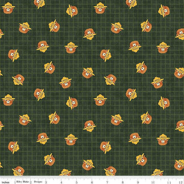 Image of the Friends of Smokey Bear Head Toss Forest quilting cotton fabric. Features smokey heads on a green background. Cute Little Fabric Shop