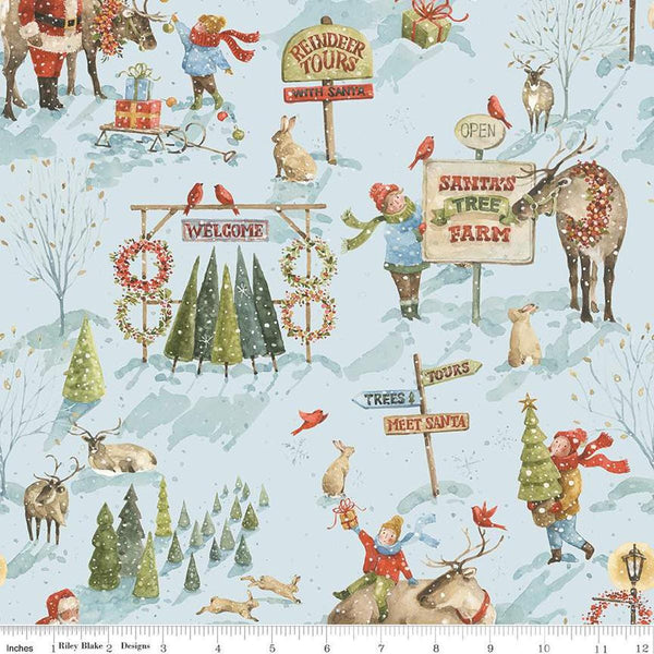 Image of the Santa&#39;s Tree Farm Main Sky quilting cotton fabric by Riley Blake Designs. Features christmas icons on a blue background. Cute Little Fabric Shop