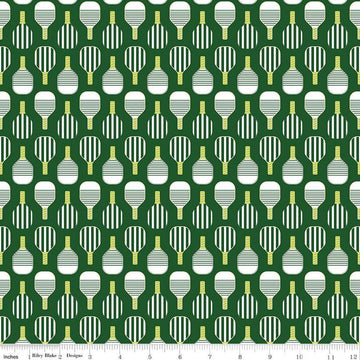Image of the Pickleball Paddles Green quilting cotton fabric by Riley Blake Designs. Features paddles on a green background. Cute Little Fabric Shop