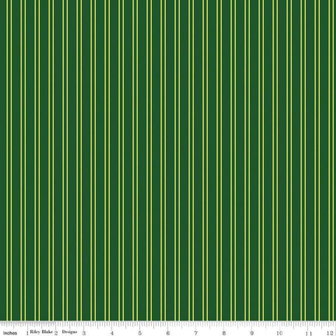 Image of the Pickleball Stripes Green quilting cotton fabric by Riley Blake Designs. Features pickleball items on a green background. Cute Little Fabric Shop