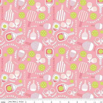 Image of the Pickleball Main Pink quilting cotton fabric by Riley Blake Designs. Features pickleball items on a pink background. Cute Little Fabric Shop