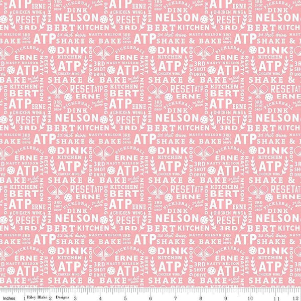 Image of the Pickleball Text Pink quilting cotton fabric by Riley Blake Designs. Features text on a pink background. Cute Little Fabric Shop