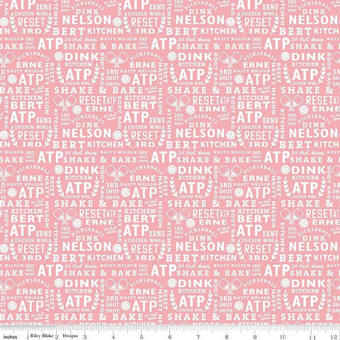 Image of the Pickleball Text Pink quilting cotton fabric by Riley Blake Designs. Features text on a pink background. Cute Little Fabric Shop