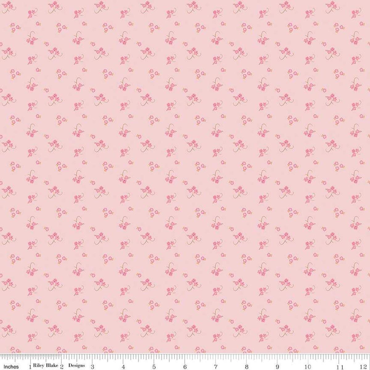 Image of the Bluegrass Charm Floral Pink quilting cotton fabric by Riley Blake Designs. Features flowers on a pink background. Cute Little Fabric Shop
