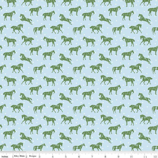 Image of the Bluegrass Charm Horses Mist quilting cotton fabric by Riley Blake Designs. Features horses on a blue background. Cute Little Fabric Shop