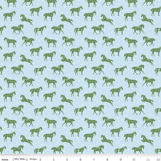 Image of the Bluegrass Charm Horses Mist quilting cotton fabric by Riley Blake Designs. Features horses on a blue background. Cute Little Fabric Shop