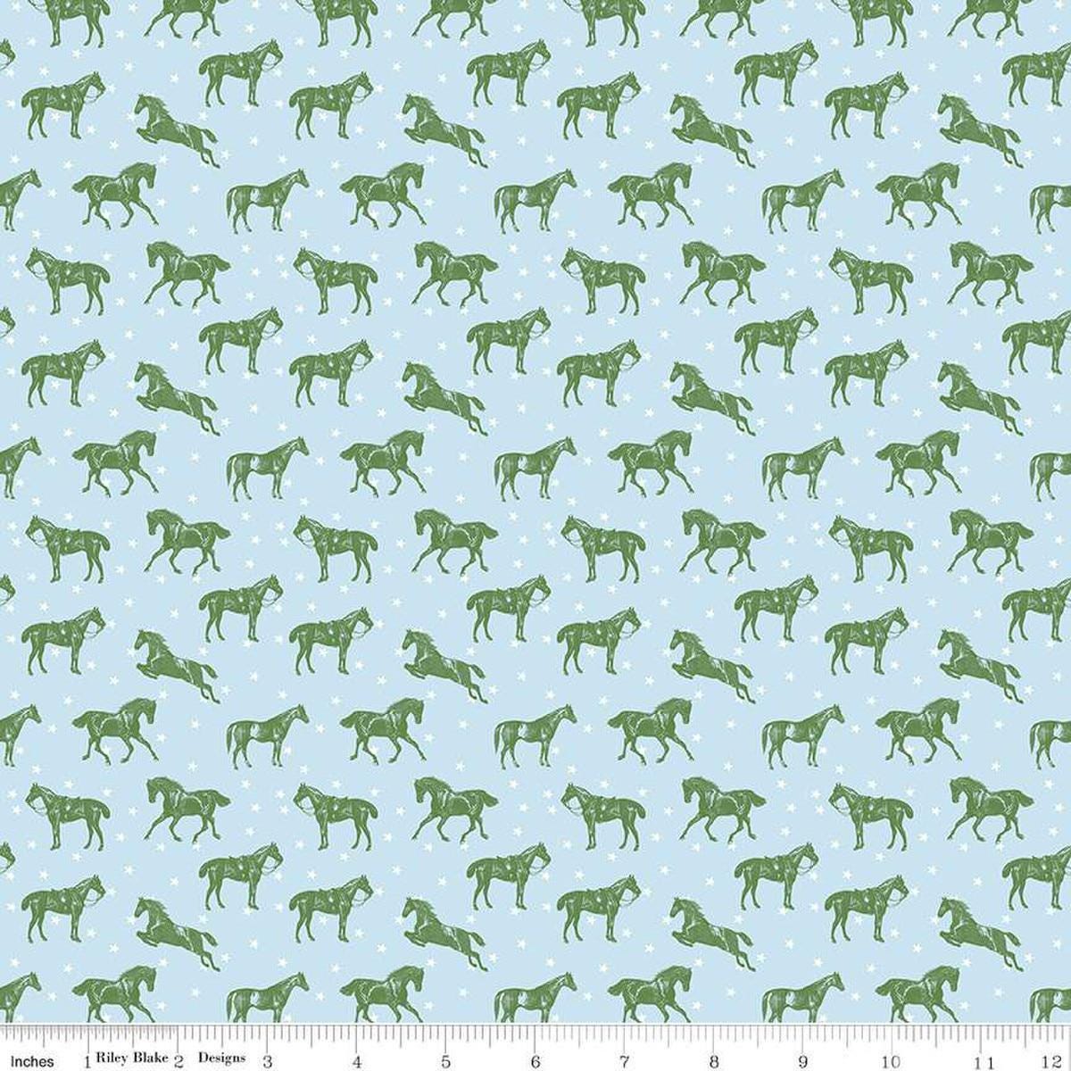 Image of the Bluegrass Charm Horses Mist quilting cotton fabric by Riley Blake Designs. Features horses on a blue background. Cute Little Fabric Shop