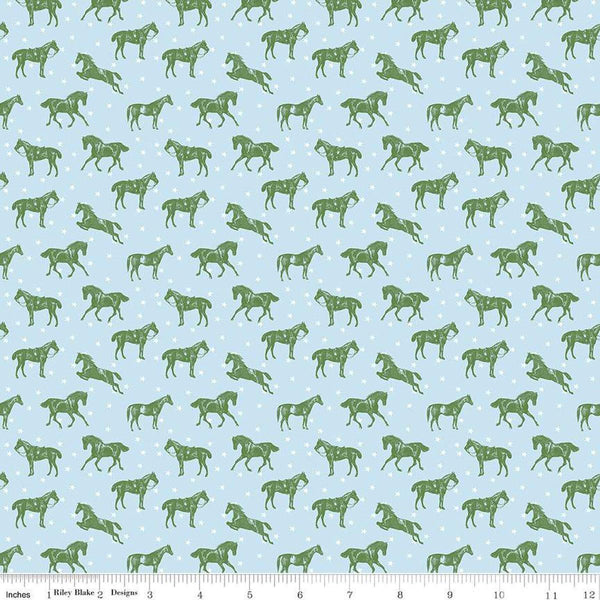 Image of the Bluegrass Charm Horses Mist quilting cotton fabric by Riley Blake Designs. Features horses on a blue background. Cute Little Fabric Shop