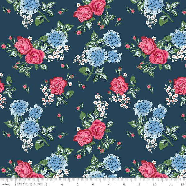 Image of the Bluegrass Charm Main Navy quilting cotton fabric by Riley Blake Designs. Features flowers on a blue background. Cute Little Fabric Shop