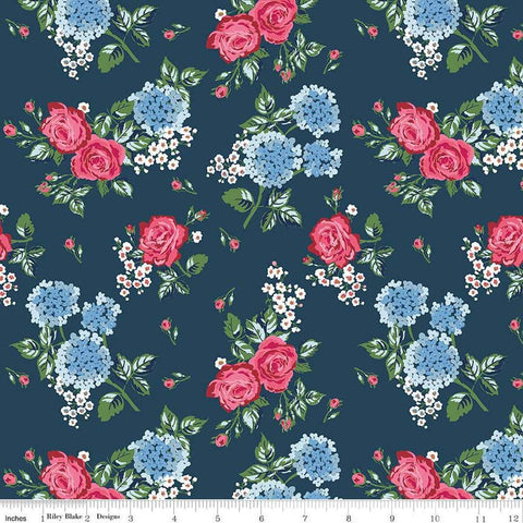 Image of the Bluegrass Charm Main Navy quilting cotton fabric by Riley Blake Designs. Features flowers on a blue background. Cute Little Fabric Shop