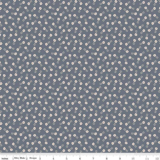Image of the Cozy Bebe Flowers Blue quilting cotton by Riley Blake Designs. Features flowers on a blue background. Cute Little Fabric Shop