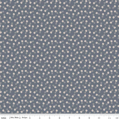 Image of the Cozy Bebe Flowers Blue quilting cotton by Riley Blake Designs. Features flowers on a blue background. Cute Little Fabric Shop