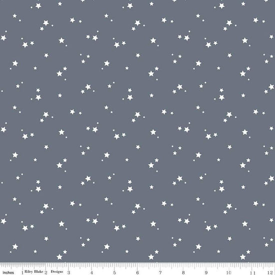 Image of the Cozy Bebe Stars Blue quilting cotton by Riley Blake Designs. Features stars on a blue background. Cute Little Fabric Shop