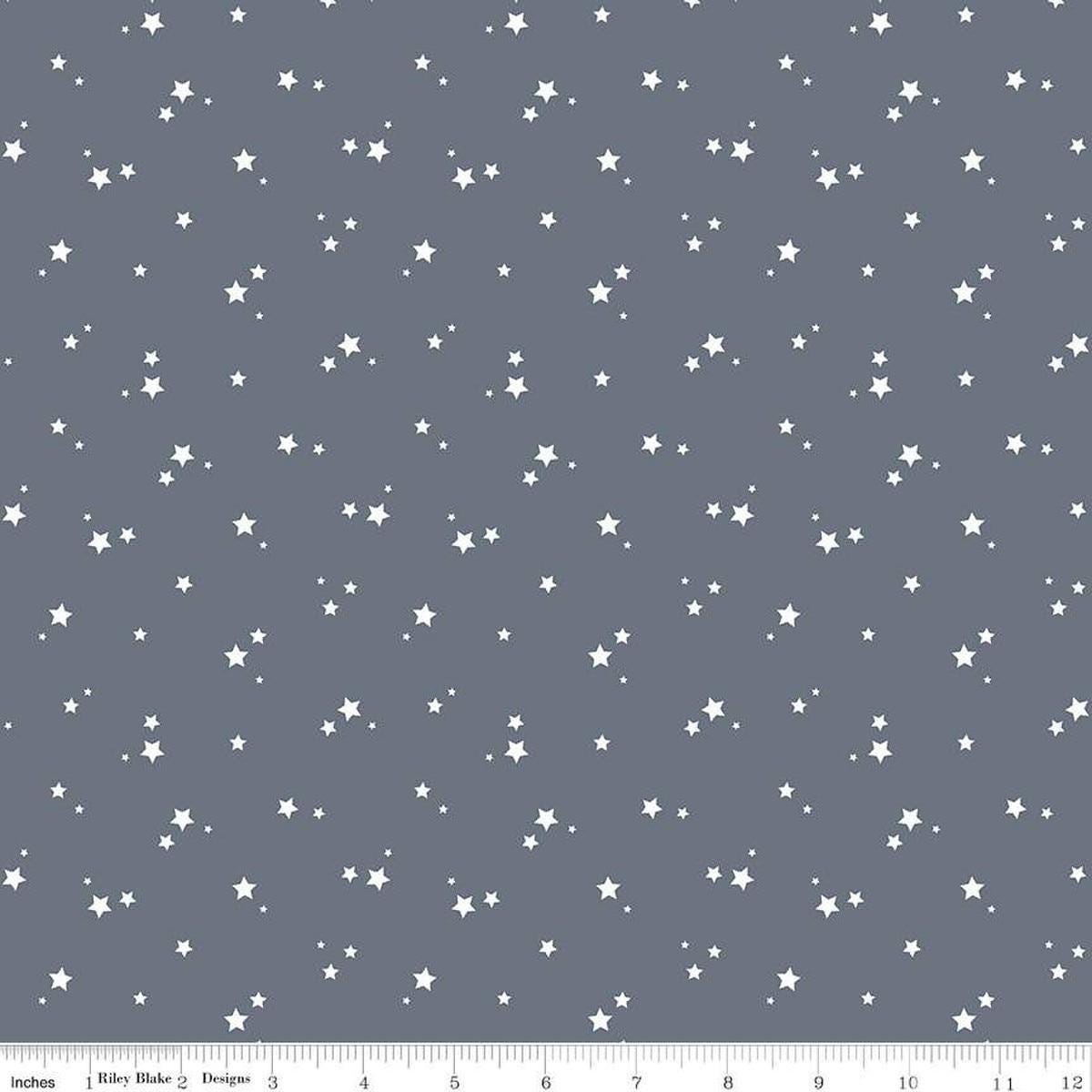 Image of the Cozy Bebe Stars Blue quilting cotton by Riley Blake Designs. Features stars on a blue background. Cute Little Fabric Shop