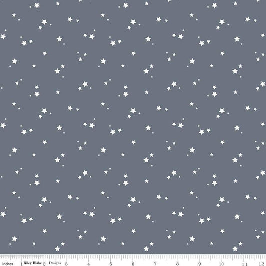 Image of the Cozy Bebe Stars Blue quilting cotton by Riley Blake Designs. Features stars on a blue background. Cute Little Fabric Shop