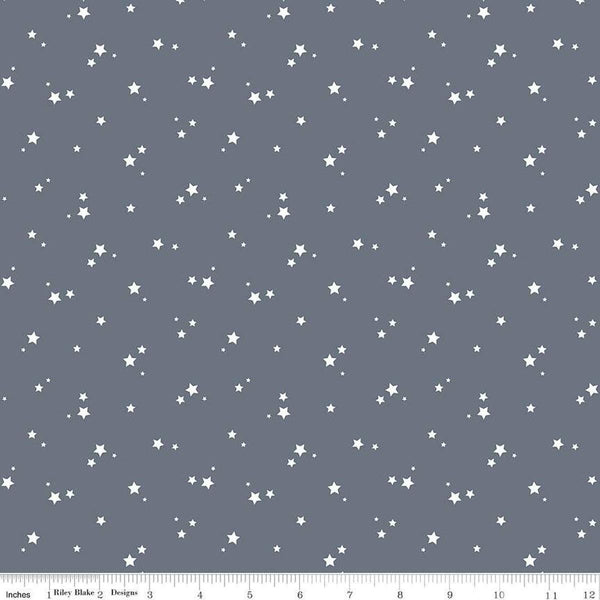 Image of the Cozy Bebe Stars Blue quilting cotton by Riley Blake Designs. Features stars on a blue background. Cute Little Fabric Shop