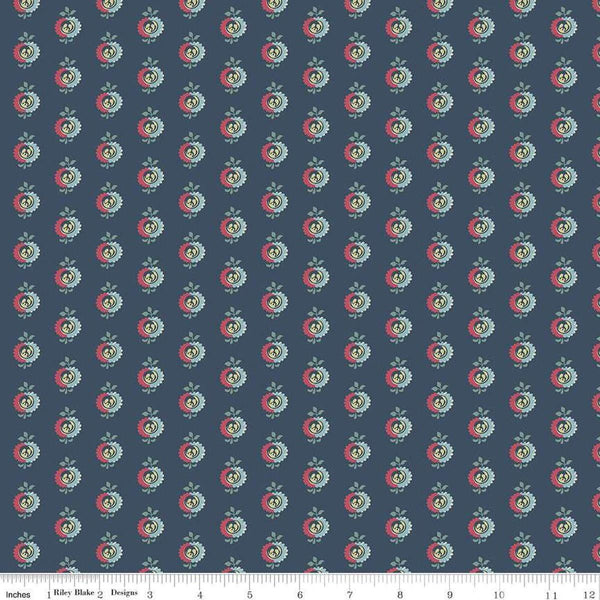 Image of the Emma Frank Churchill quilting cotton fabric by Riley Blake Designs. Features flowers on a blue background. Cute Little Fabric Shop