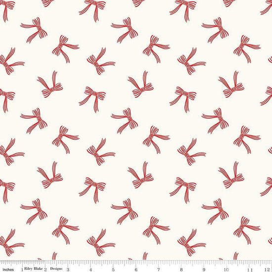 Image of the Flannel Bows Cream quilting cotton fabric by Riley Blake Designs. Features bows on a cream background. Cute Little Fabric Shop