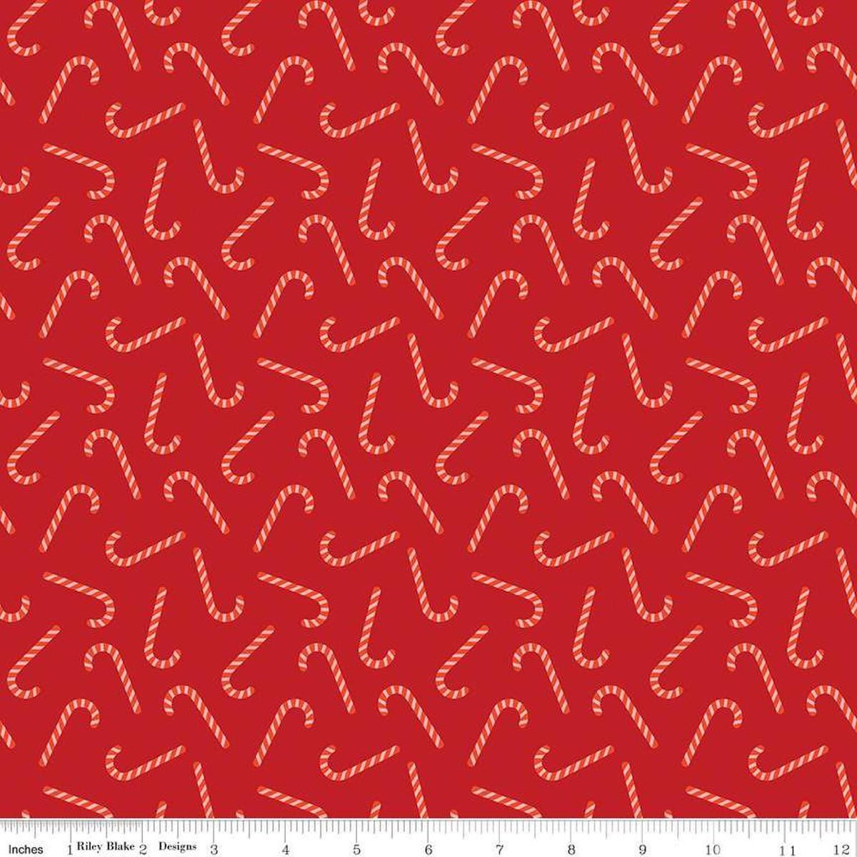 Image of the Flannel Candy Canes Red quilting cotton fabric by Riley Blake Designs. Features candy canes on a red background. Cute Little Fabric Shop