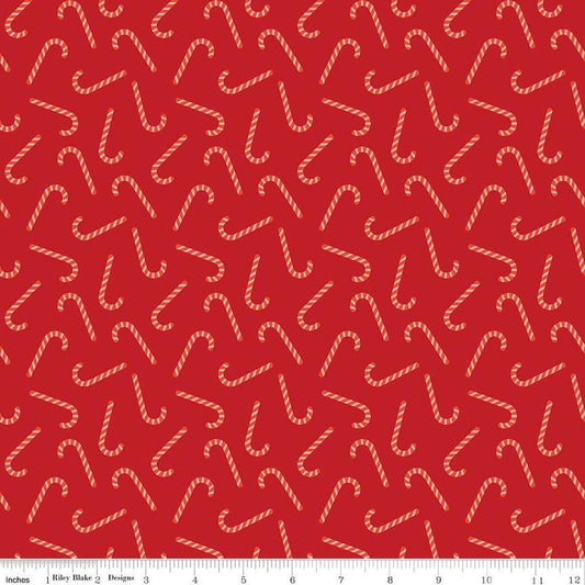 Image of the Flannel Candy Canes Red quilting cotton fabric by Riley Blake Designs. Features candy canes on a red background. Cute Little Fabric Shop