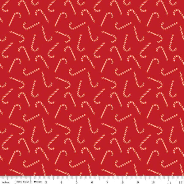 Image of the Flannel Candy Canes Red quilting cotton fabric by Riley Blake Designs. Features candy canes on a red background. Cute Little Fabric Shop