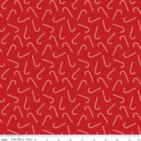 Image of the Flannel Candy Canes Red quilting cotton fabric by Riley Blake Designs. Features candy canes on a red background. Cute Little Fabric Shop