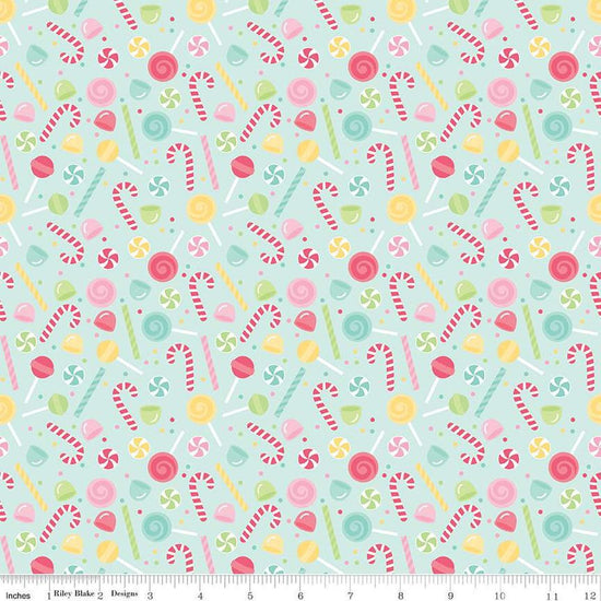 Image of the Flannel Sweets blue quilting cotton fabric by Riley Blake Designs. Features sweets on a blue background. Cute Little Fabric Shop