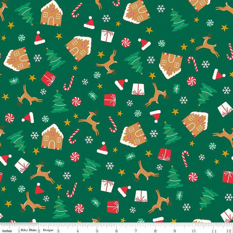 Image of the Flannel Christmas Icons Green quilting cotton fabric by Riley Blake Designs. Features icons on a green background. Cute Little Fabric Shop