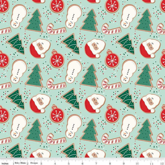 Image of the Flannel Christmas Cookies Songbird quilting cotton fabric by Riley Blake Designs. Features cookies on a blue background. Cute Little Fabric Shop