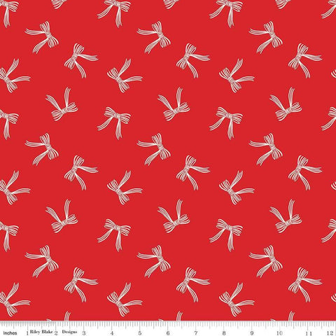 Image of the Flannel Bows Red quilting cotton fabric by Riley Blake Designs. Features bows on a re background. Cute Little Fabric Shop