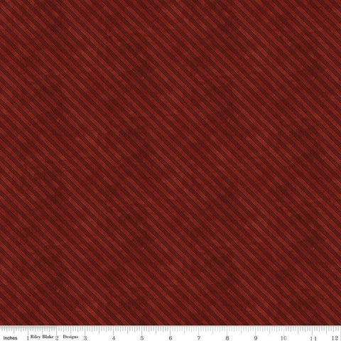 Image of the Naughty and Nice Ticking Red quilting cotton fabric by Riley Blake Designs. Features stripes on a red background. Cute Little Fabric Shop