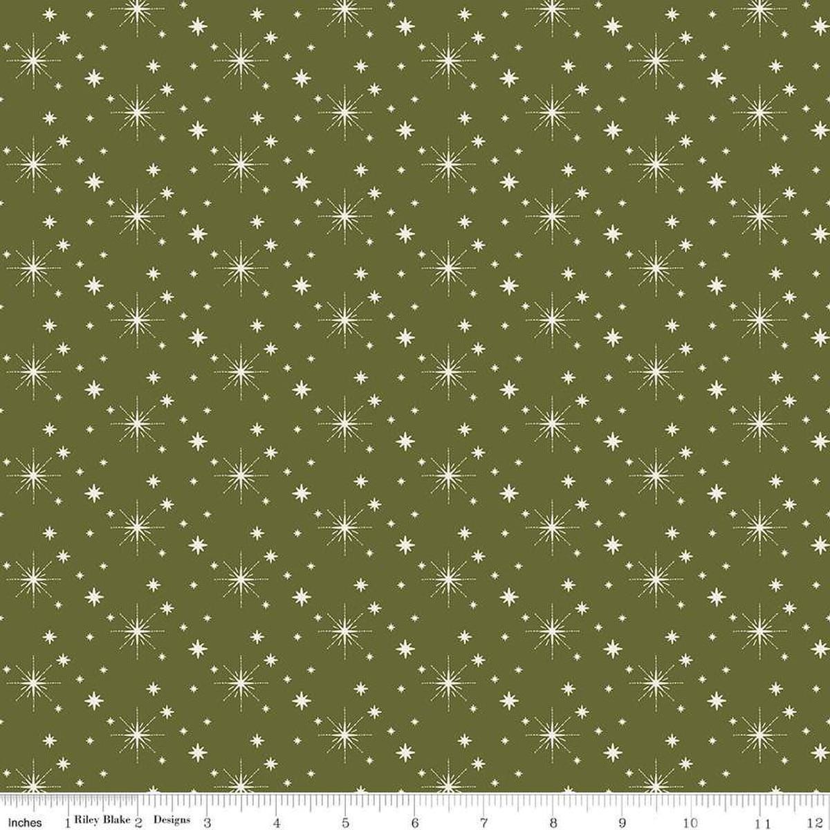 Image of the Glisten Stars Green  quilting cotton fabric by Riley Blake Designs. features stars on a green background. Cute Little Fabric Shop