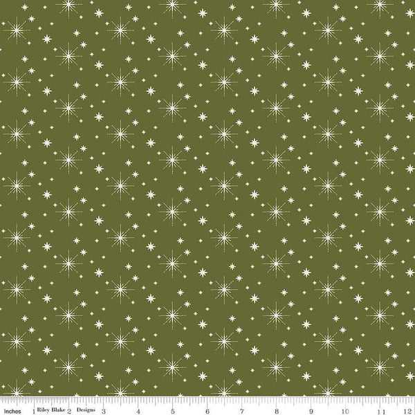 Image of the Glisten Stars Green  quilting cotton fabric by Riley Blake Designs. features stars on a green background. Cute Little Fabric Shop