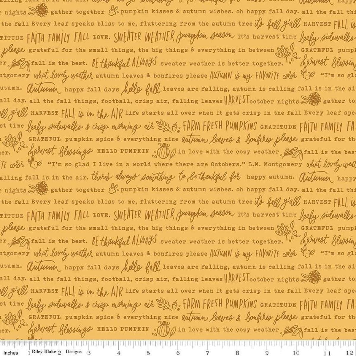 Image of the Happy Fall Days Autumn Words Gold quilting cotton fabric by Riley Blake Designs. Features text on a gold background. Cute Little Fabric Shop