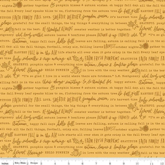 Image of the Happy Fall Days Autumn Words Gold quilting cotton fabric by Riley Blake Designs. Features text on a gold background. Cute Little Fabric Shop