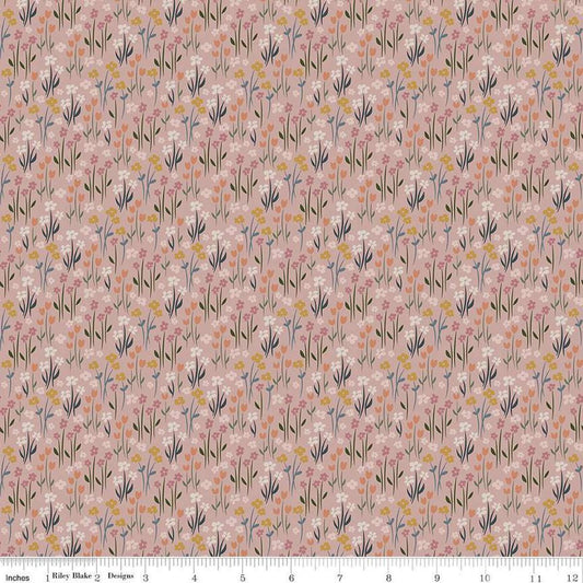 Image of the Honey Locust Meadow Petal quilting cotton fabric by Riley Blake Designs. Features flowers on a pink background.