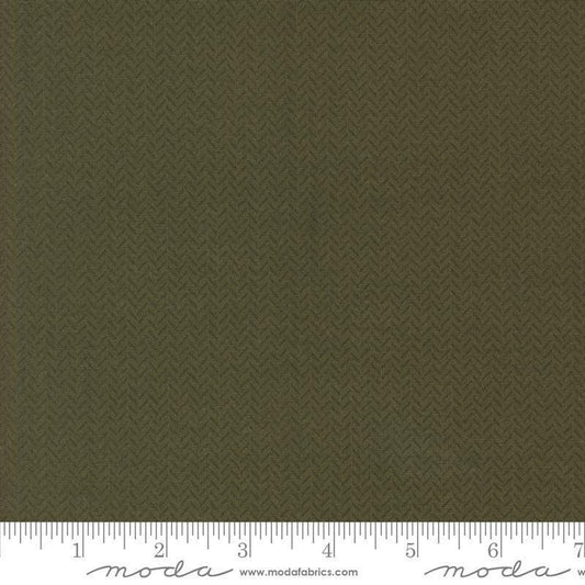 Image of the Berry and Pine Yule Wintergreen quilting cotton fabric by Moda Fabrics. Features lines on a green background. Cute Little Fabric Shop